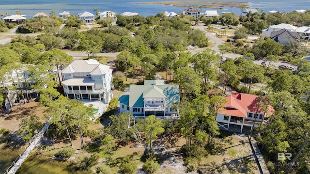 aerial view with a water view and a residential view