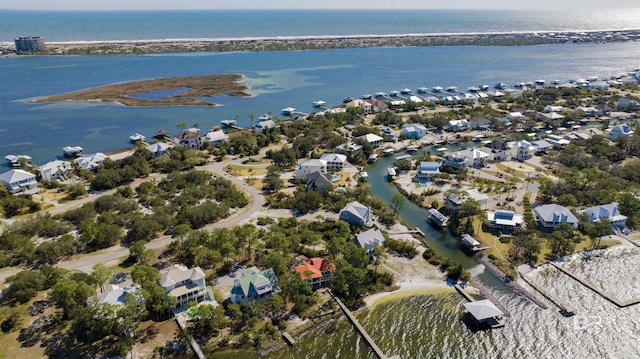 birds eye view of property featuring a residential view and a water view