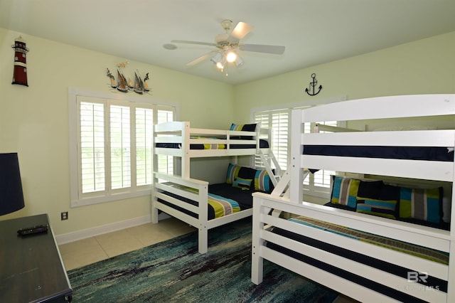 9397 S Bay Rd, Foley, AL 36535 - bedroom with tile patterned flooring and baseboards