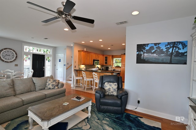 9397 S Bay Rd, Foley, AL 36535 - living room with recessed lighting, baseboards, ceiling fan, visible vents, and wood finished floors