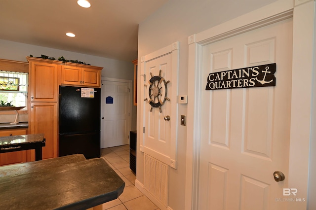 9397 S Bay Rd, Foley, AL 36535 - kitchen featuring freestanding refrigerator, light tile patterned flooring, visible vents, and recessed lighting