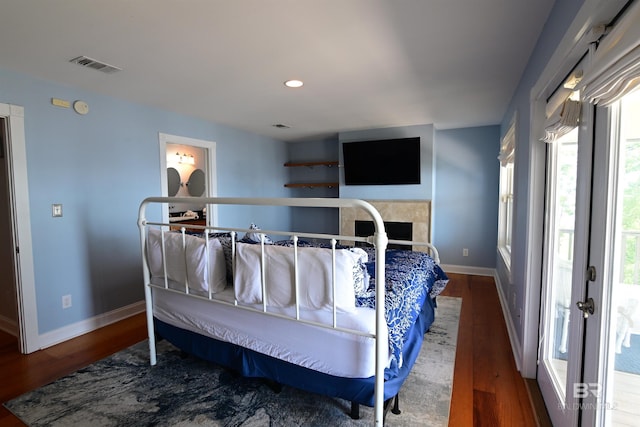 9397 S Bay Rd, Foley, AL 36535 - bedroom with wood finished floors, recessed lighting, baseboards, and visible vents