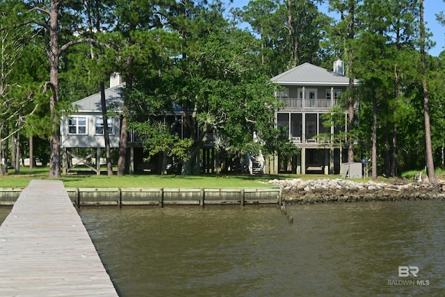 9397 S Bay Rd, Foley, AL 36535 - view of dock with a balcony, a water view, and a yard