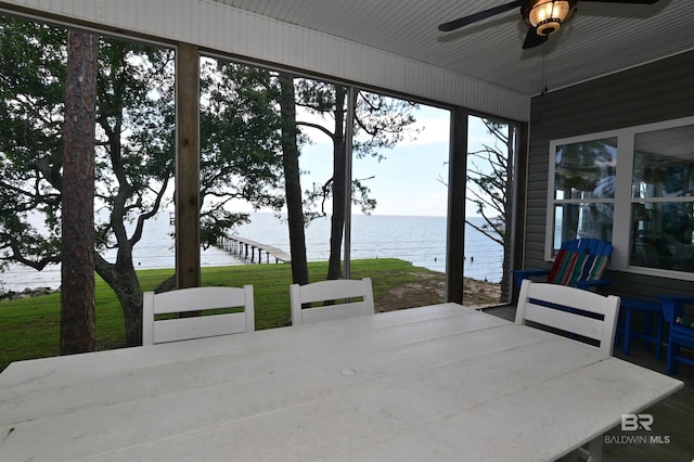 9397 S Bay Rd, Foley, AL 36535 - sunroom / solarium with a water view, outdoor dining area, and a ceiling fan