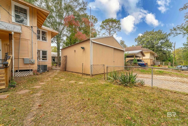 view of yard featuring central AC