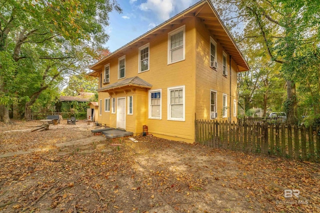 back of property with a patio area