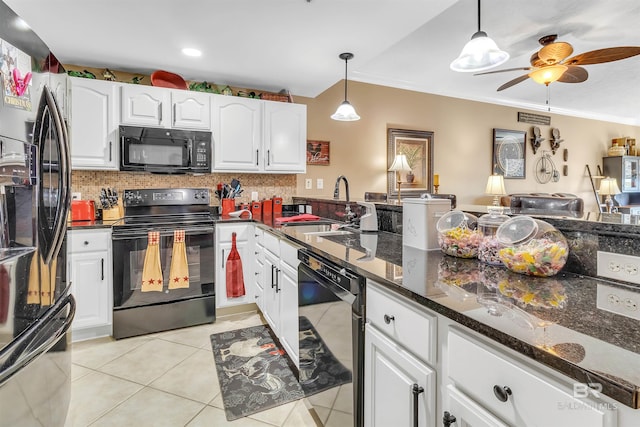 kitchen featuring a sink, backsplash, black appliances, and light tile patterned flooring