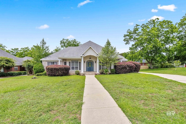 view of front of home with a front lawn