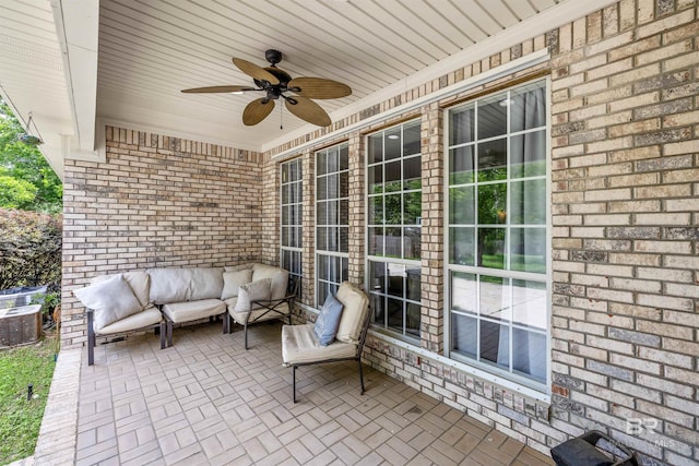 view of patio with ceiling fan and outdoor lounge area