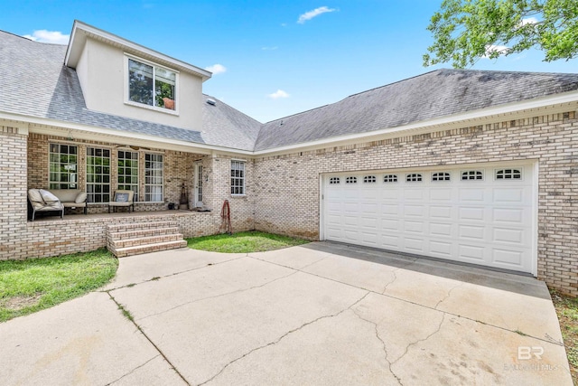 view of front of property with a garage and a porch