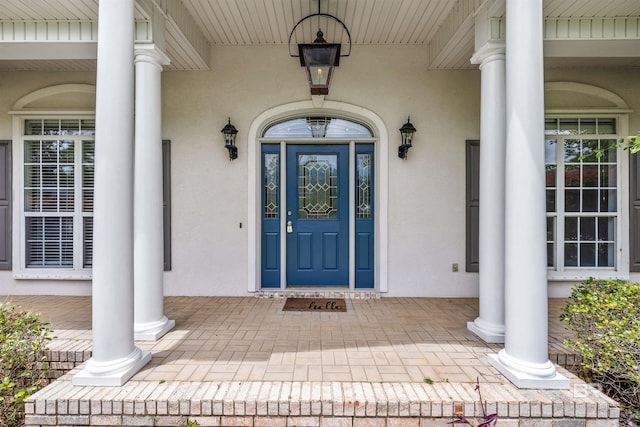 property entrance featuring covered porch