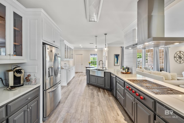 kitchen featuring gray cabinetry, wall chimney exhaust hood, stainless steel refrigerator with ice dispenser, sink, and white cabinets