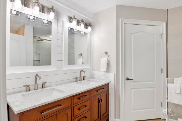 bathroom featuring vanity and an enclosed shower