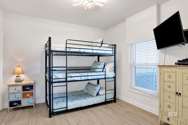 bedroom with light hardwood / wood-style flooring