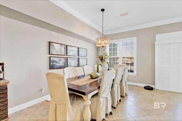 dining room with an inviting chandelier, baseboards, crown molding, and light tile patterned flooring