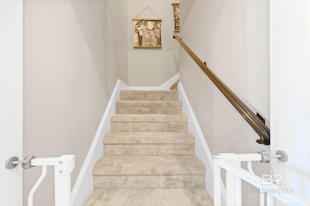 stairway with baseboards