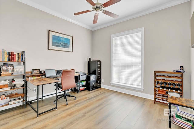 office space featuring ornamental molding, a ceiling fan, baseboards, and wood finished floors