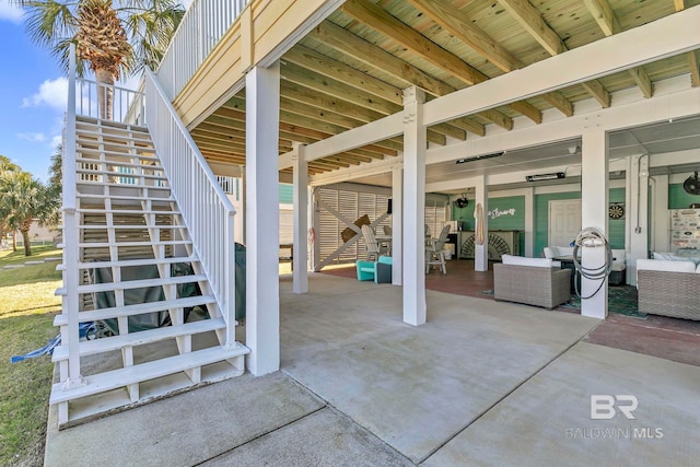 view of patio featuring stairway