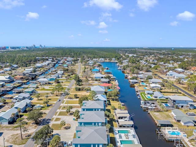 aerial view featuring a residential view and a water view