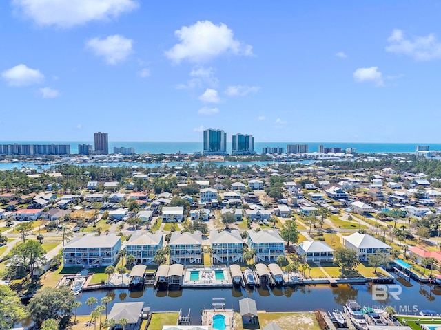 drone / aerial view with a water view