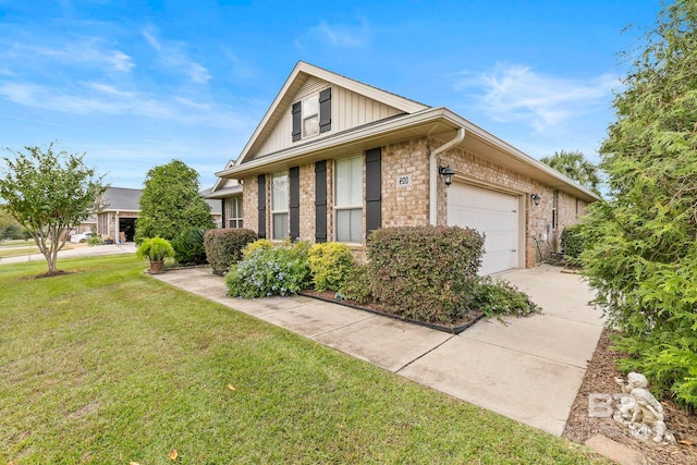 view of front of house featuring a front lawn and a garage