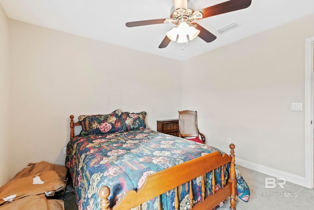 bedroom featuring ceiling fan and carpet