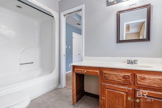 bathroom featuring bathing tub / shower combination, visible vents, toilet, vanity, and tile patterned flooring