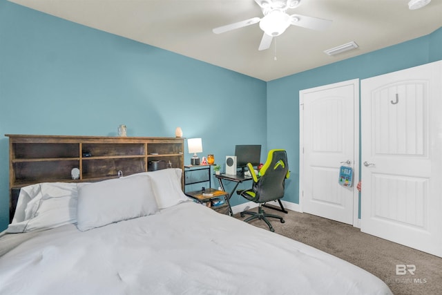 carpeted bedroom with ceiling fan