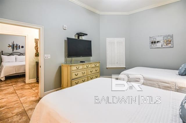 tiled bedroom with crown molding