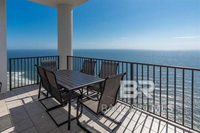 balcony featuring a water view