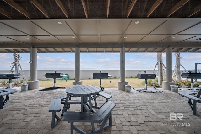 view of patio / terrace featuring a water view