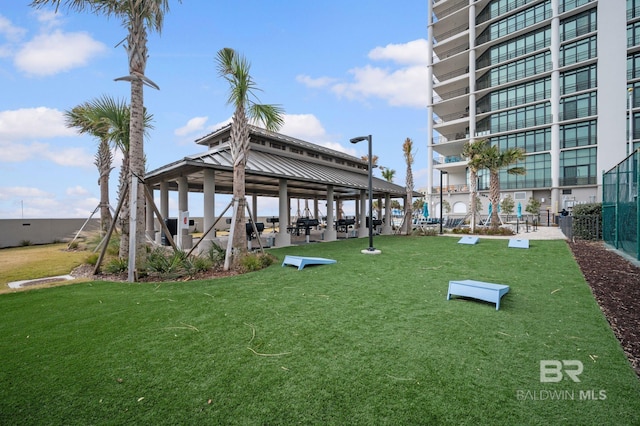 view of community with a gazebo and a lawn