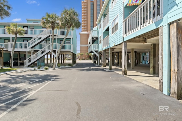 view of road featuring stairway