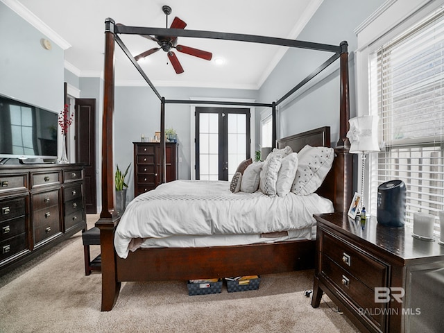 carpeted bedroom with crown molding, french doors, and ceiling fan