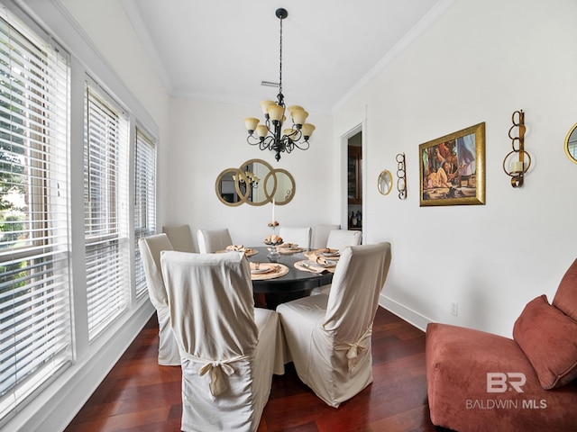 dining area with a notable chandelier, crown molding, and dark wood-type flooring