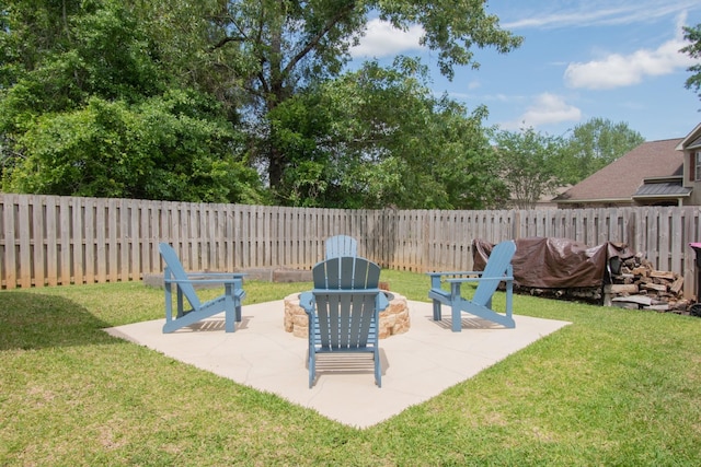 view of patio / terrace featuring an outdoor fire pit