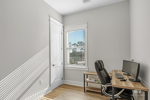 office space featuring light wood-type flooring