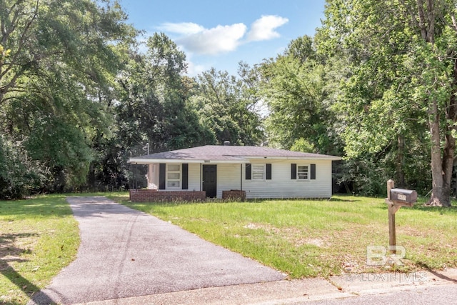 6451 S Barker Dr, Mobile, AL 36608 - view of front of property with driveway, a front yard, and covered porch