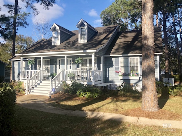 cape cod-style house with a porch