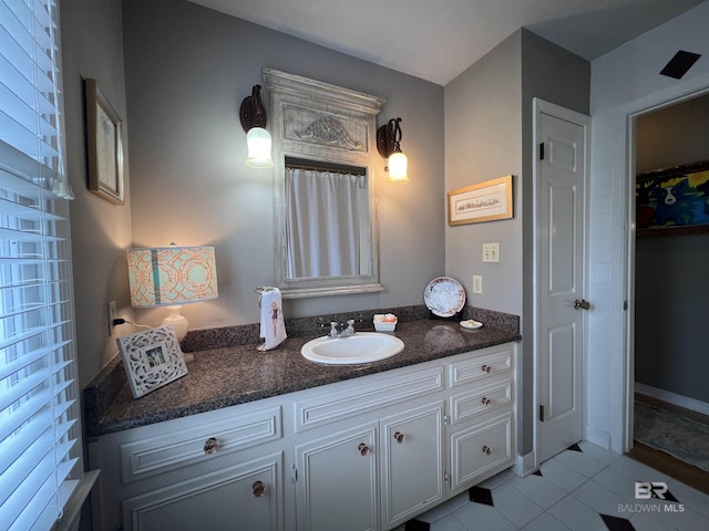 bathroom featuring vanity and tile patterned floors