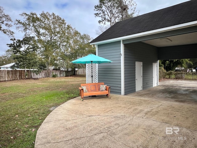 exterior space with a carport