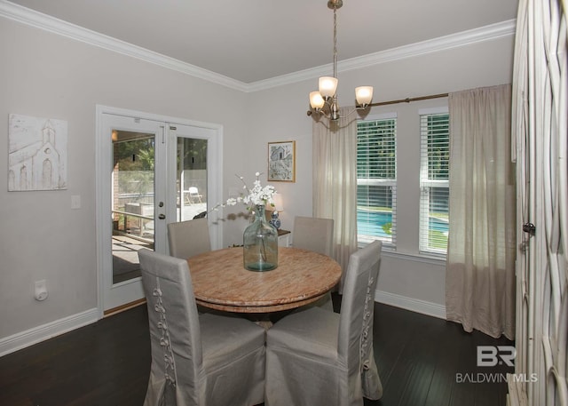 dining area with baseboards, a wealth of natural light, dark wood-style floors, and a chandelier