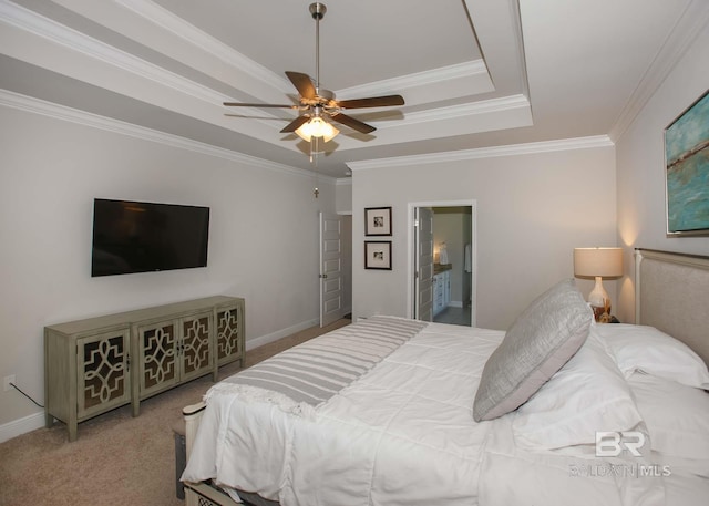 carpeted bedroom with a tray ceiling, ceiling fan, ornamental molding, and baseboards