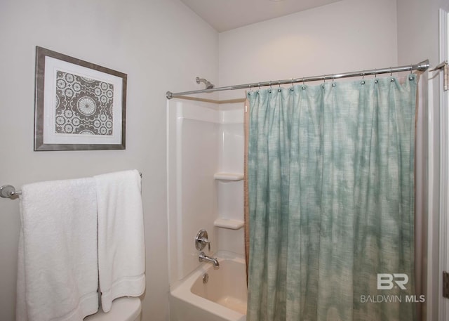 bathroom featuring shower / bath combo with shower curtain