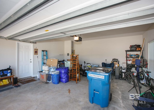 garage featuring a garage door opener