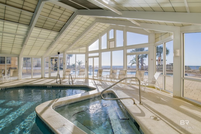 pool with an indoor in ground hot tub