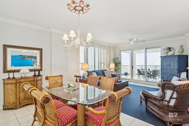 dining area with light tile patterned floors and crown molding