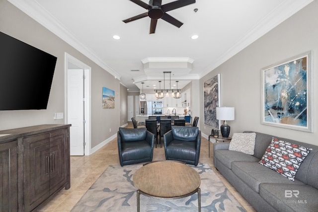 living room with crown molding, baseboards, light tile patterned floors, recessed lighting, and ceiling fan with notable chandelier