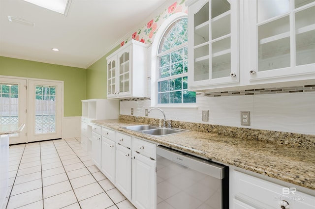 19711 Hunters Loop, Fairhope, AL 36532 - kitchen featuring stainless steel dishwasher, a sink, white cabinets, and glass insert cabinets