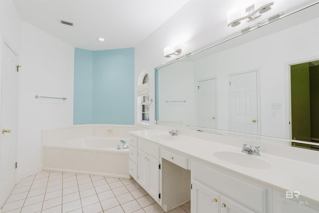 19711 Hunters Loop, Fairhope, AL 36532 - full bath with double vanity, a bath, tile patterned flooring, recessed lighting, and baseboards